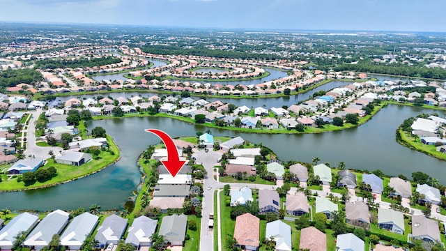 107 NW Summerville Ct, Port Saint Lucie, FL 34986 - aerial view of property's location with nearby suburban area and a large body of water