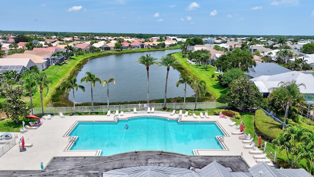 107 NW Summerville Ct, Port Saint Lucie, FL 34986 - community pool with a water view and a residential view