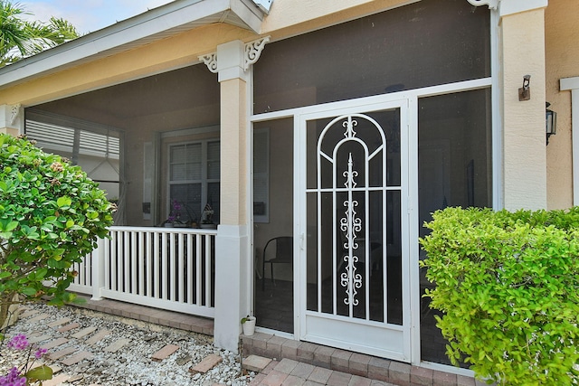 107 NW Summerville Ct, Port Saint Lucie, FL 34986 - property entrance with stucco siding