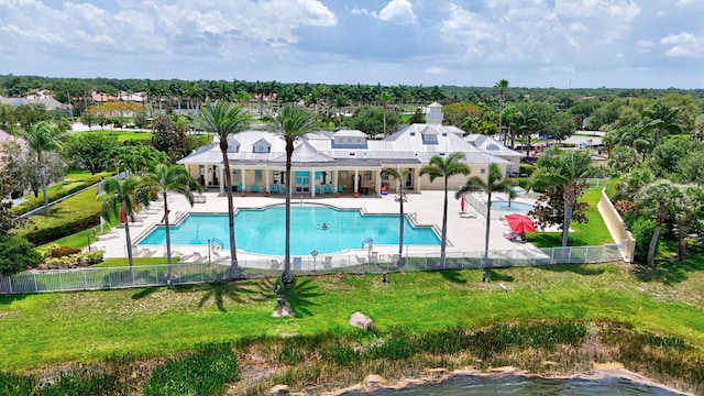 107 NW Summerville Ct, Port Saint Lucie, FL 34986 - community pool featuring a patio area