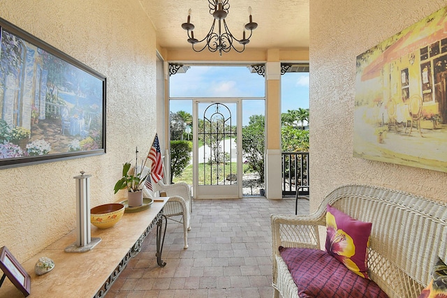 107 NW Summerville Ct, Port Saint Lucie, FL 34986 - sunroom with a chandelier and plenty of natural light