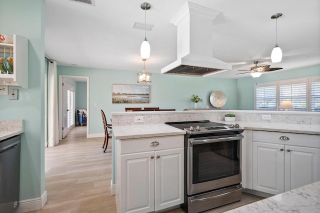 4575 SW Bimini Cir S, Palm City, FL 34990 - kitchen with stainless steel appliances, extractor fan, ceiling fan, and white cabinetry