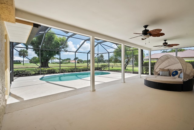 4575 SW Bimini Cir S, Palm City, FL 34990 - swimming pool featuring a patio, a ceiling fan, and a lanai