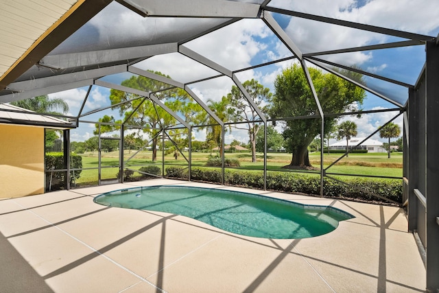4575 SW Bimini Cir S, Palm City, FL 34990 - outdoor pool featuring a patio area and glass enclosure