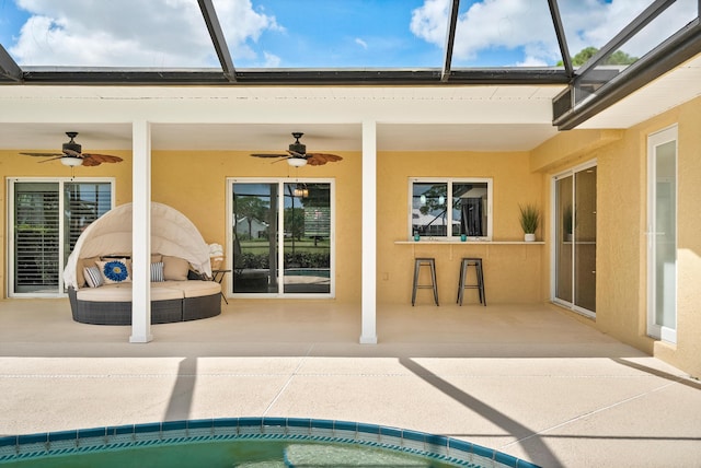 4575 SW Bimini Cir S, Palm City, FL 34990 - view of swimming pool featuring a ceiling fan, a patio area, and a lanai