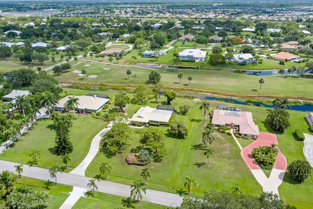 4575 SW Bimini Cir S, Palm City, FL 34990 - aerial perspective of suburban area featuring a nearby body of water and a golf course