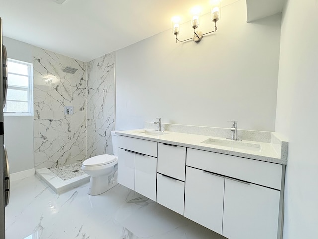 307 4th St, Lake Park, FL 33403 - full bathroom with double vanity, a marble finish shower, toilet, and marble finish flooring