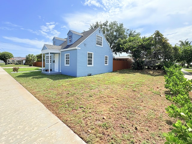 307 4th St, Lake Park, FL 33403 - view of property exterior featuring roof with shingles