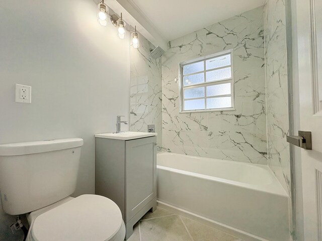 307 4th St, Lake Park, FL 33403 - bathroom with vanity, toilet, shower / tub combination, and tile patterned flooring