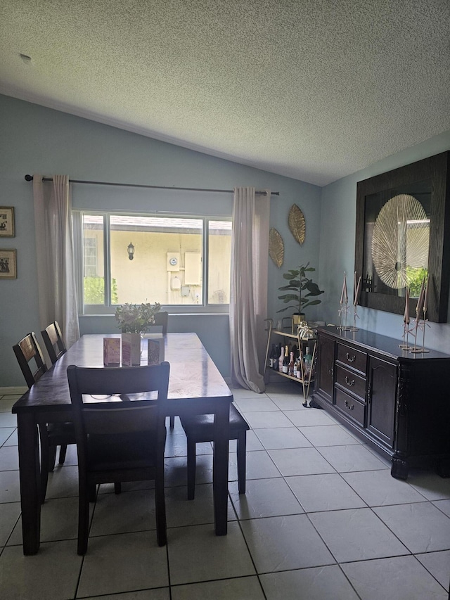 8700 NW 46th Ct, Lauderhill, FL 33351 - dining area with plenty of natural light, a textured ceiling, and light tile patterned floors