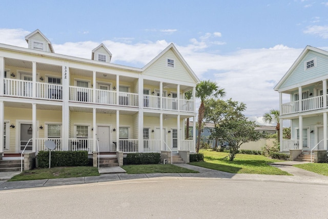 3322 Monterey Square Ln Unit 104, Fort Pierce, FL 34982 - view of front of house with a balcony and covered porch