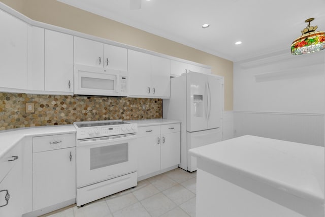 10664 Royal Caribbean Cir, Boynton Beach, FL 33437 - kitchen featuring white appliances, white cabinets, light countertops, light tile patterned flooring, and recessed lighting