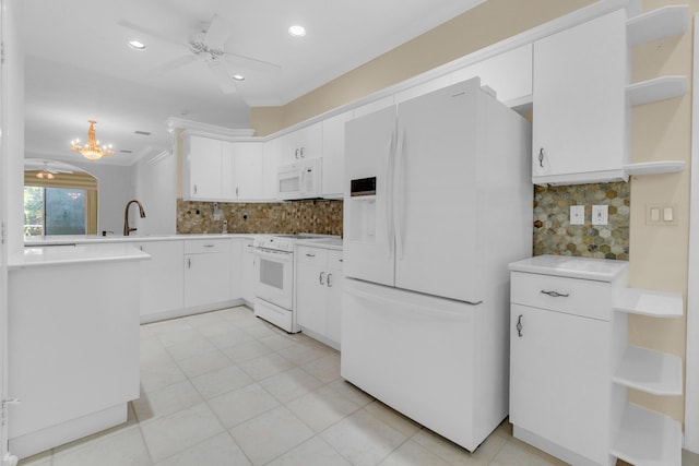 10664 Royal Caribbean Cir, Boynton Beach, FL 33437 - kitchen featuring white appliances, open shelves, tasteful backsplash, light countertops, and recessed lighting