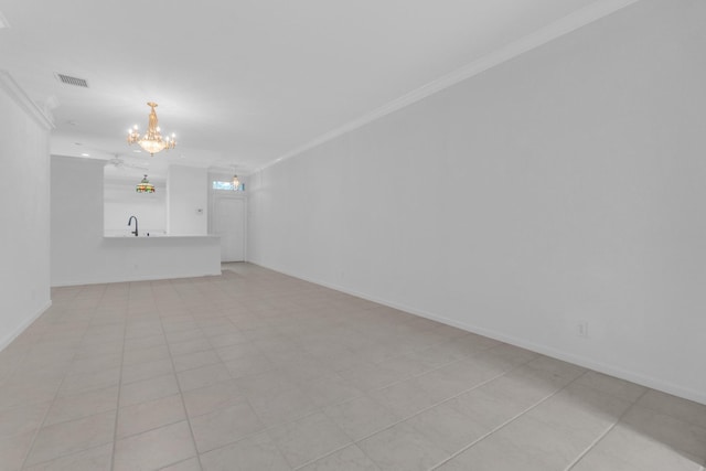 10664 Royal Caribbean Cir, Boynton Beach, FL 33437 - unfurnished living room with a chandelier, ornamental molding, a sink, and baseboards