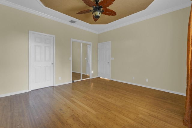 10664 Royal Caribbean Cir, Boynton Beach, FL 33437 - unfurnished bedroom with ornamental molding, wood finished floors, baseboards, and ceiling fan