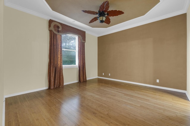 10664 Royal Caribbean Cir, Boynton Beach, FL 33437 - empty room with wood finished floors, a ceiling fan, baseboards, and ornamental molding
