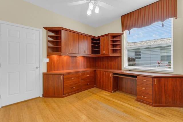 10664 Royal Caribbean Cir, Boynton Beach, FL 33437 - unfurnished office featuring built in desk, light wood-style flooring, and a ceiling fan