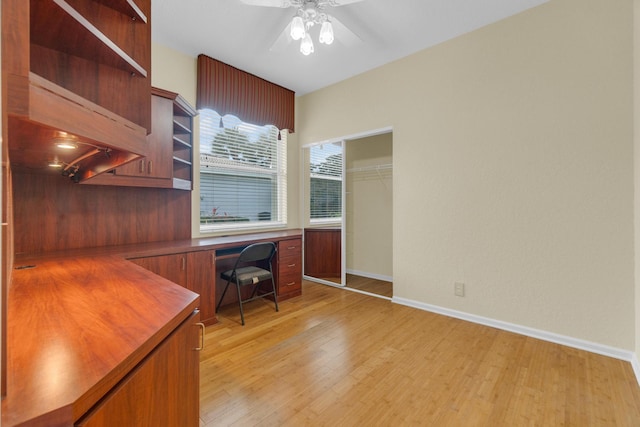 10664 Royal Caribbean Cir, Boynton Beach, FL 33437 - office area with light wood-style floors, ceiling fan, and baseboards