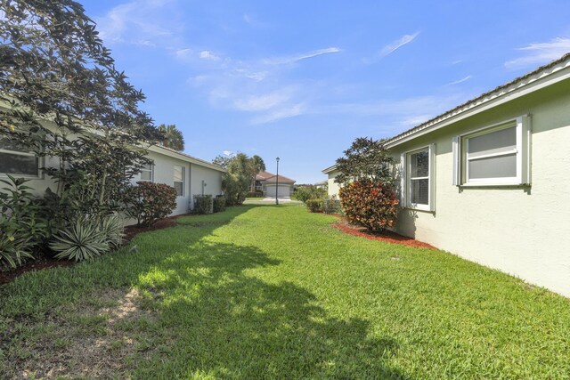 10664 Royal Caribbean Cir, Boynton Beach, FL 33437 - view of green lawn