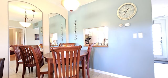 4299 NW 16th St Unit 303, Lauderhill, FL 33313 - dining space with light tile patterned floors and baseboards