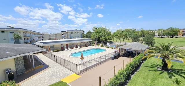 4299 NW 16th St Unit 303, Lauderhill, FL 33313 - community pool featuring a patio area