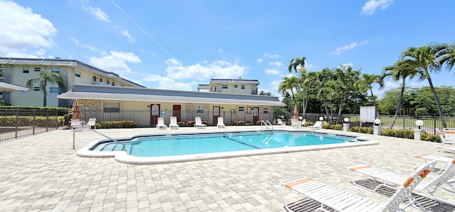 4299 NW 16th St Unit 303, Lauderhill, FL 33313 - community pool with a patio
