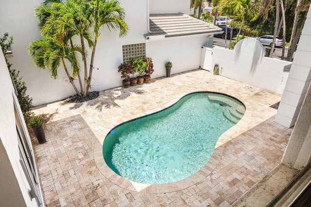 5779 Regency Cir W, Boca Raton, FL 33496 - swimming pool featuring a patio area