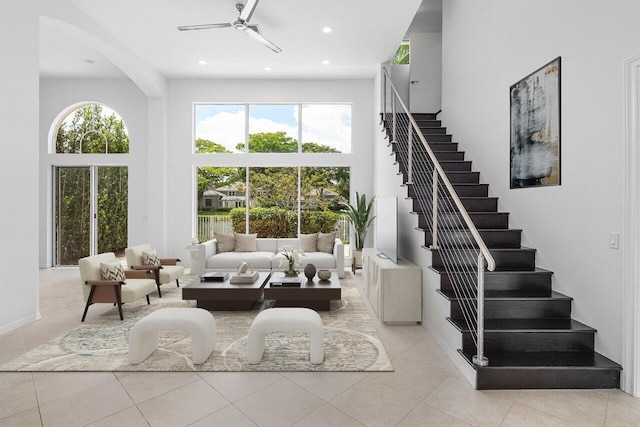 5779 Regency Cir W, Boca Raton, FL 33496 - living area featuring a high ceiling, stairs, ceiling fan, tile patterned flooring, and recessed lighting