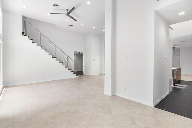 5779 Regency Cir W, Boca Raton, FL 33496 - unfurnished living room with ceiling fan, stairs, recessed lighting, tile patterned floors, and baseboards