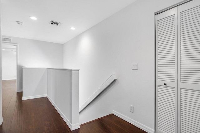 5779 Regency Cir W, Boca Raton, FL 33496 - hall featuring an upstairs landing, wood finished floors, recessed lighting, and baseboards