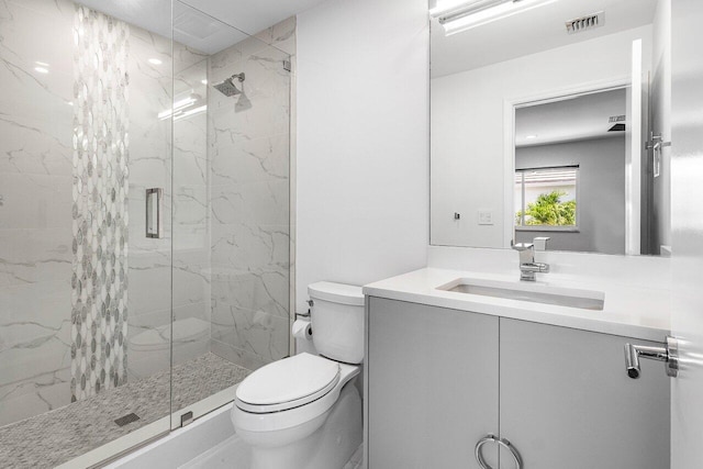 5779 Regency Cir W, Boca Raton, FL 33496 - full bathroom with toilet, a marble finish shower, and vanity