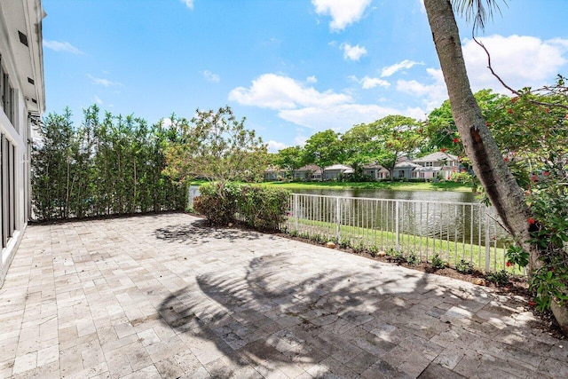 5779 Regency Cir W, Boca Raton, FL 33496 - view of patio / terrace with a water view and a residential view