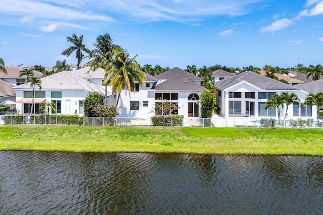 5779 Regency Cir W, Boca Raton, FL 33496 - rear view of property featuring a water view, a tiled roof, and stucco siding