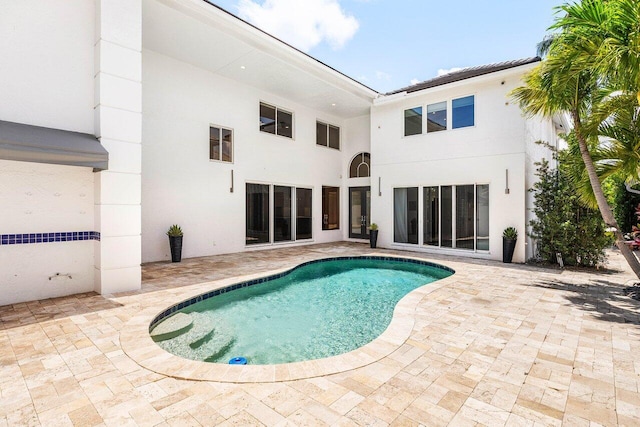 5779 Regency Cir W, Boca Raton, FL 33496 - swimming pool featuring a patio