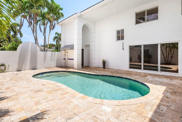 5779 Regency Cir W, Boca Raton, FL 33496 - view of swimming pool featuring a patio area
