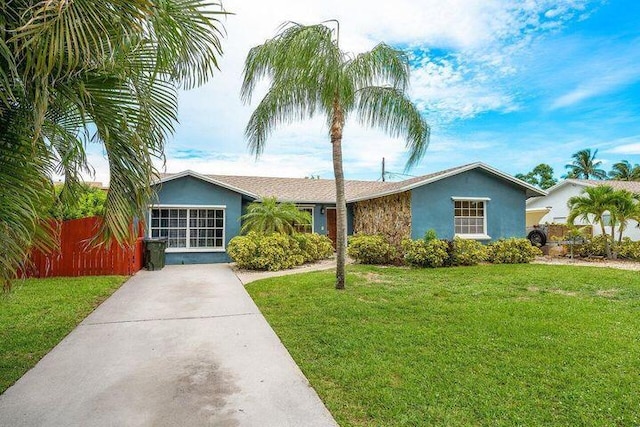 803 Mallard Dr, Delray Beach, FL 33444 - ranch-style house featuring stucco siding and concrete driveway