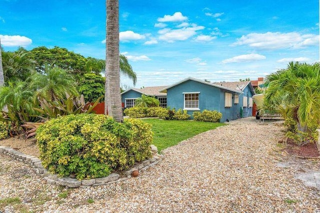 803 Mallard Dr, Delray Beach, FL 33444 - ranch-style house featuring stucco siding and a front yard