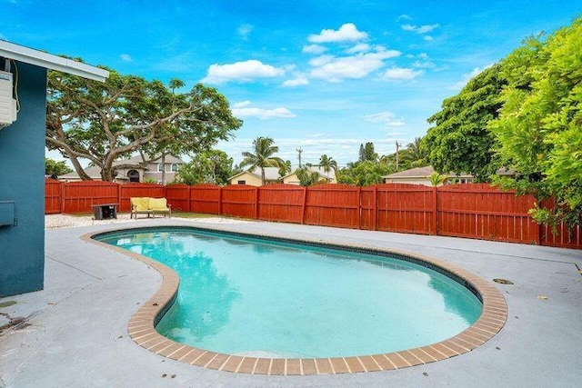 803 Mallard Dr, Delray Beach, FL 33444 - view of pool featuring a fenced backyard and a patio