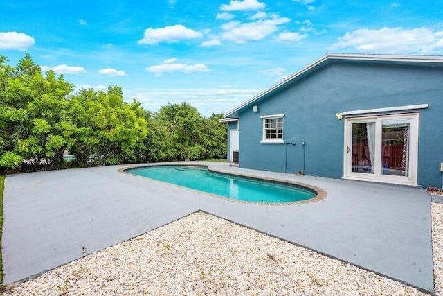 803 Mallard Dr, Delray Beach, FL 33444 - swimming pool featuring a patio