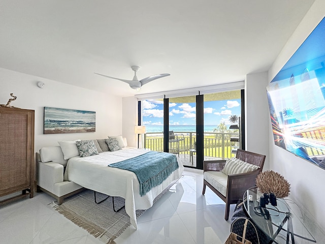 3000 N Ocean Dr Unit 4-D, Singer Island, FL 33404 - bedroom with access to outside, light tile patterned floors, ceiling fan, and a wall of windows