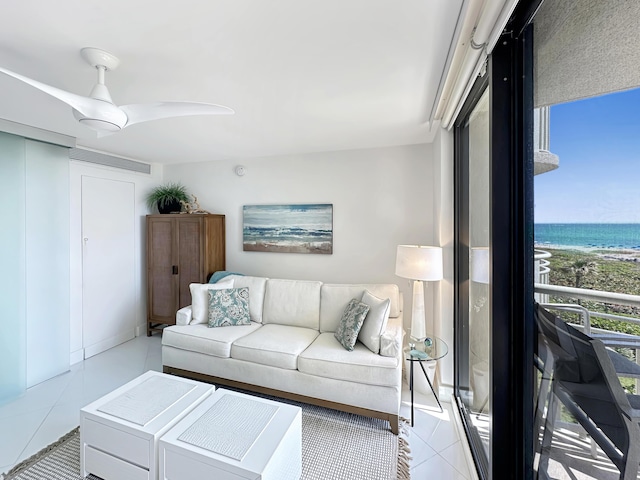 3000 N Ocean Dr Unit 4-D, Singer Island, FL 33404 - living area featuring light tile patterned floors and a water view