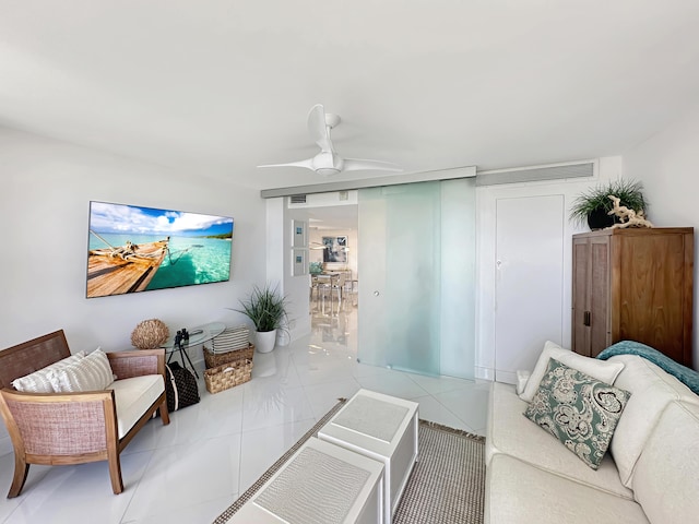 3000 N Ocean Dr Unit 4-D, Singer Island, FL 33404 - living room featuring ceiling fan and light tile patterned floors