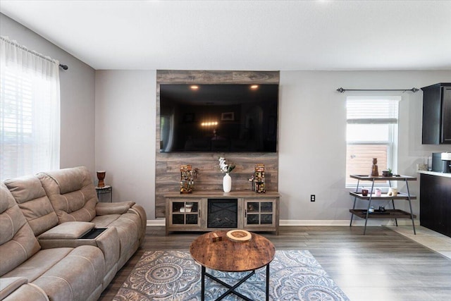3313 SW Ludlow St, Port Saint Lucie, FL 34953 - living area featuring wood finished floors and baseboards