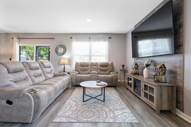 3313 SW Ludlow St, Port Saint Lucie, FL 34953 - living area featuring wood finished floors and recessed lighting