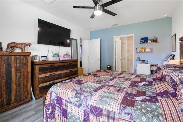 3313 SW Ludlow St, Port Saint Lucie, FL 34953 - bedroom with wood finished floors and a ceiling fan
