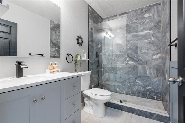 3313 SW Ludlow St, Port Saint Lucie, FL 34953 - full bath featuring a tile shower, toilet, vanity, and a textured ceiling