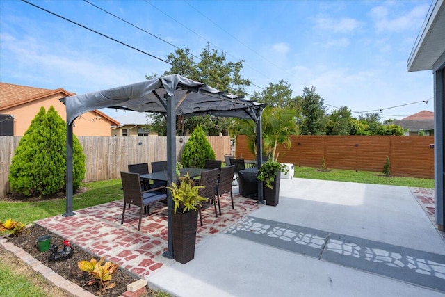 3313 SW Ludlow St, Port Saint Lucie, FL 34953 - fenced backyard with a patio area and outdoor dining space