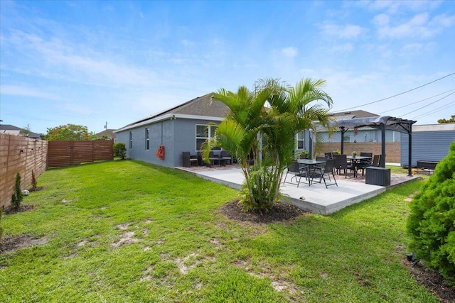 3313 SW Ludlow St, Port Saint Lucie, FL 34953 - back of house featuring a pergola and a patio