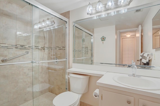 331 Knotty Pine Cir Unit C-1, Greenacres, FL 33463 - bathroom featuring toilet, vanity, and a stall shower
