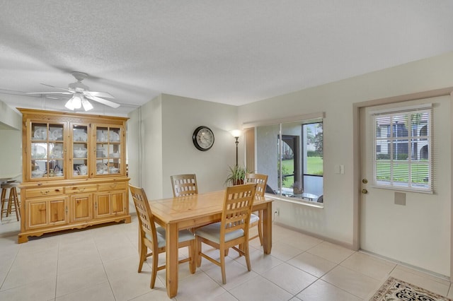 331 Knotty Pine Cir Unit C-1, Greenacres, FL 33463 - dining area featuring light tile patterned floors, ceiling fan, and a textured ceiling